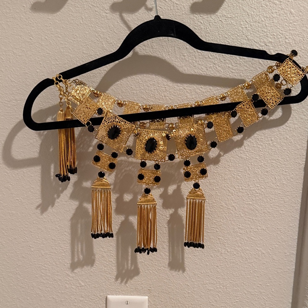 Elegant Gold and Black Tassel Belt